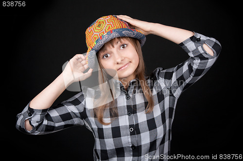 Image of Beautiful girl in colour hat