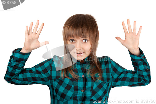 Image of Beautiful girl in plaid shirt and hand upwards