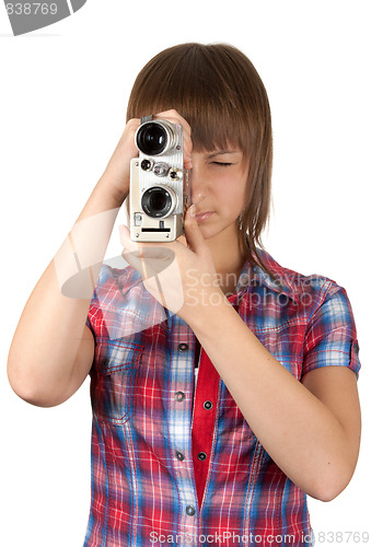Image of Girl in plaid shirt with movie camera