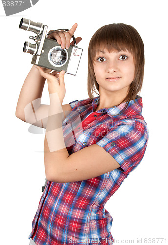 Image of Girl in plaid shirt with movie camera