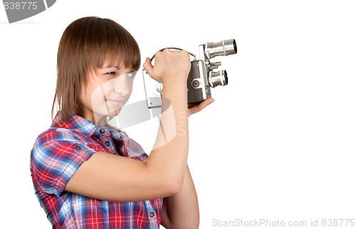 Image of Girl in plaid shirt with movie camera