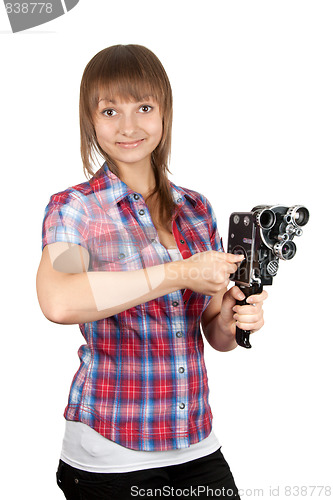 Image of Girl in plaid shirt with charges movie camera