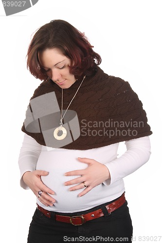 Image of pregnant woman holding belly