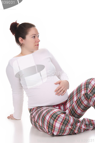 Image of pregnant woman holding belly