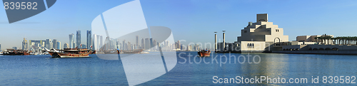 Image of Doha skyline dhows and museum