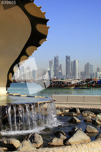 Image of Doha fountain, harbour and skyline