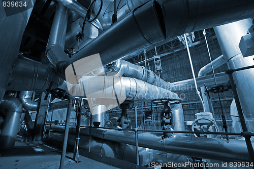 Image of industrial pipes and machines      