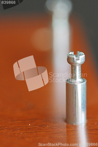 Image of Board and screw.