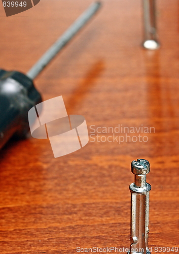 Image of Board and screw.