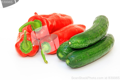 Image of Tasty kitchen. Fresh vegetables isolated on white