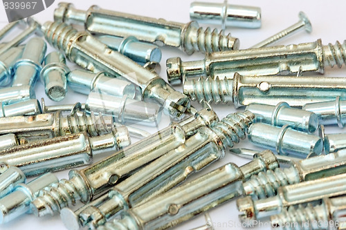 Image of Many screws and nuts isolated on white background