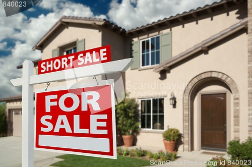 Image of Short Sale Real Estate Sign and House