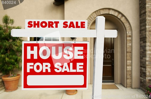 Image of Short Sale Real Estate Sign and House
