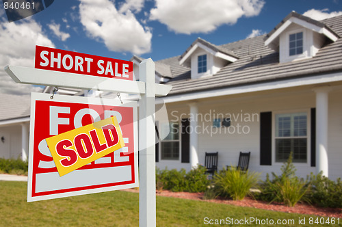 Image of Sold Short Sale Real Estate Sign and House - Left