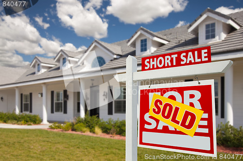 Image of Sold Short Sale Real Estate Sign and House - Right