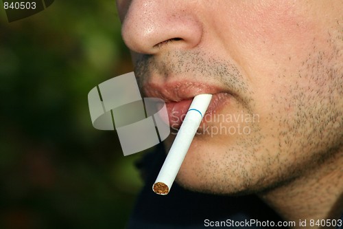 Image of Person Smoking a Cigarette