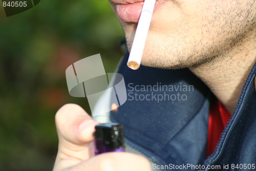 Image of Person Smoking a Cigarette