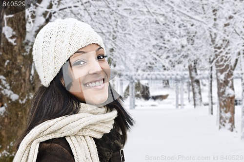 Image of Happy woman outside in winter