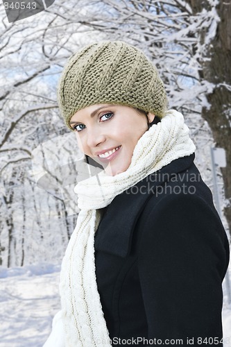 Image of Happy woman outside in winter