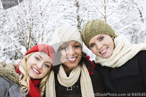 Image of Group of girl friends outside in winter