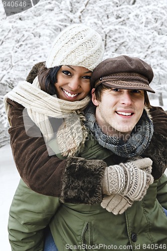 Image of Couple having fun outside in winter