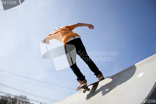 Image of Skateboarder On a Ramp