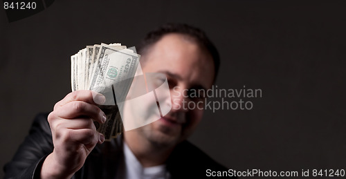 Image of Man Holding Money