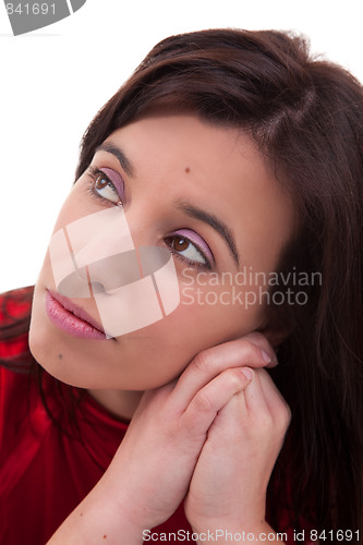 Image of pretty woman thinking with hand on the face