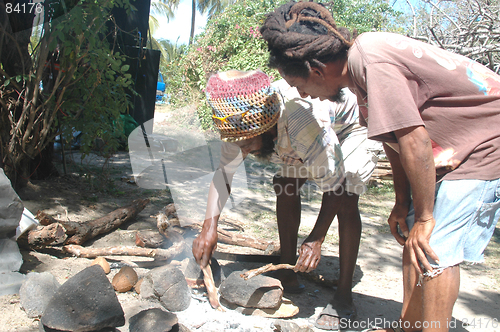 Image of rasta men starting fire 328