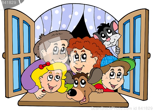 Image of Happy family in open window