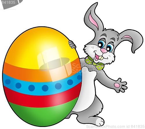 Image of Easter bunny with colorful egg