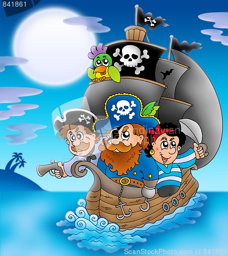 Image of Sailboat with cartoon pirates at night