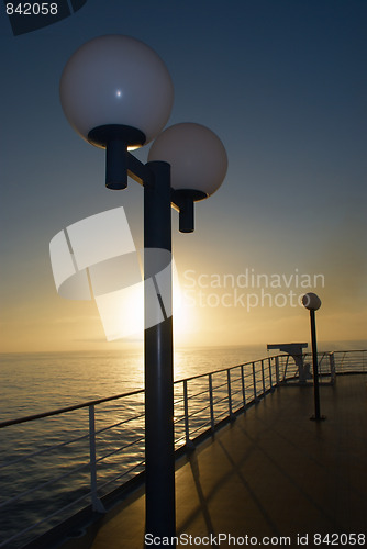 Image of ssenger Cruise ship stern view at night