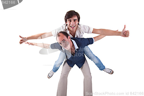 Image of two men, one carrying on his back the other