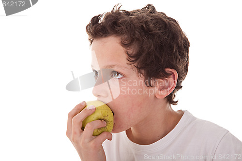 Image of boy eating a green apple