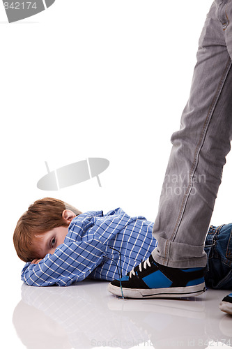 Image of an older boy crushing the glasses to a younger boy