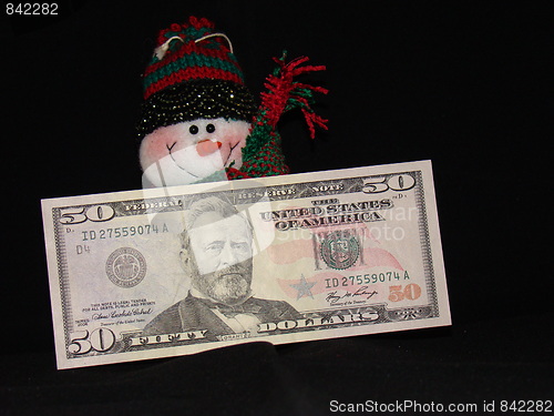 Image of A snowman and his money.