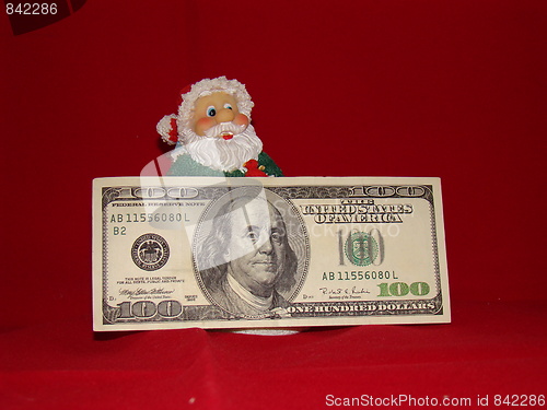 Image of Santa with money.