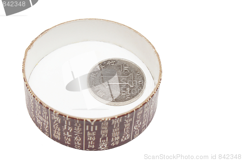 Image of One yuan in the tea box cap
