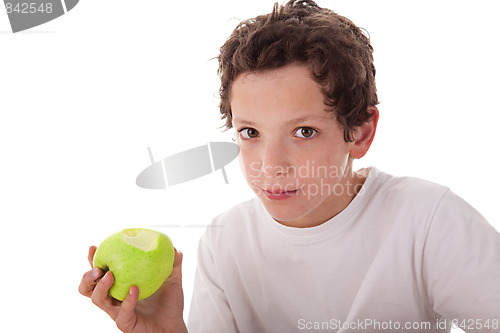 Image of boy eating a green apple