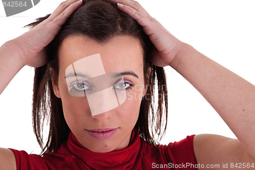 Image of beautiful woman, holding her hair with his hands