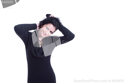 Image of beautiful woman, holding her hair with his hands