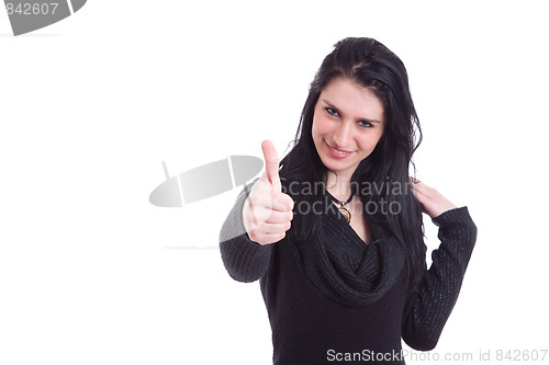 Image of Young pretty women with thumb up