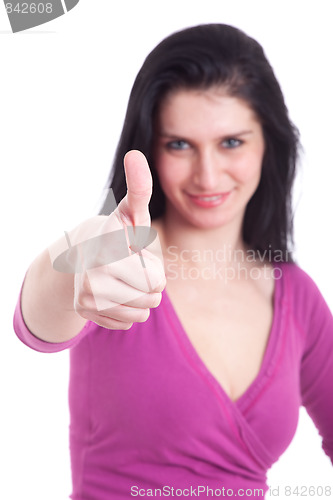 Image of Young pretty women with thumb up