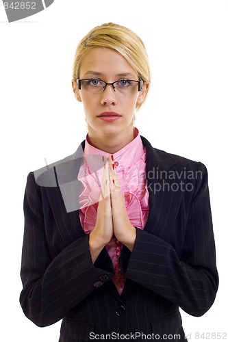 Image of businesswoman praying