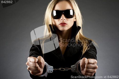 Image of woman wearing handcuffs