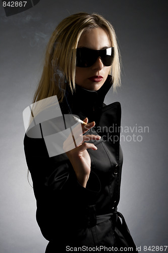 Image of gorgeous blond smoking