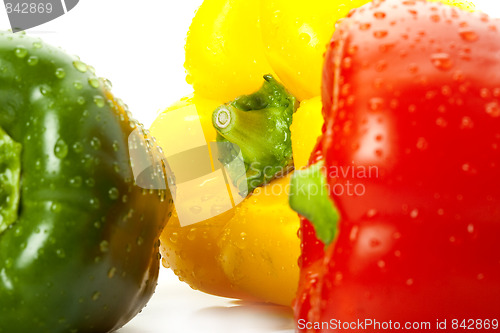 Image of  peppers with water on