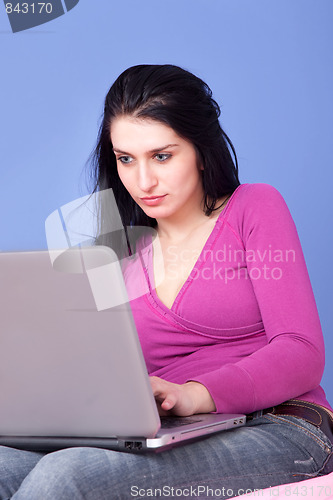 Image of pretty woman on the computer