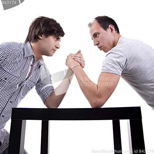 Image of two young men wrestling